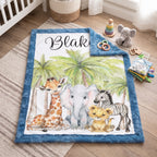 Safari personalized baby blanket flat lay on nursery rug, corner folded to show blue minky backing