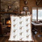 Man holding large winter elk minky blanket in cabin room with stone fireplace
