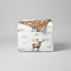 Winter elk minky blanket folded on gray background showing full elk watercolor design